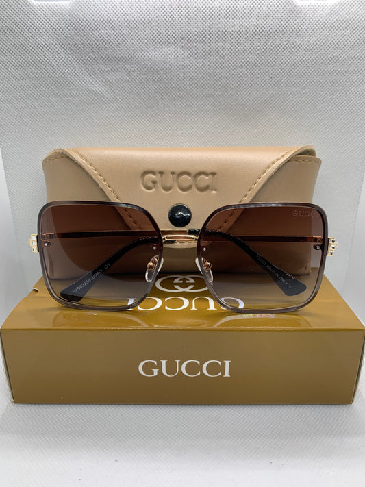 Gucci Women’s Golden Luxury Glasses – Designer Eyewear